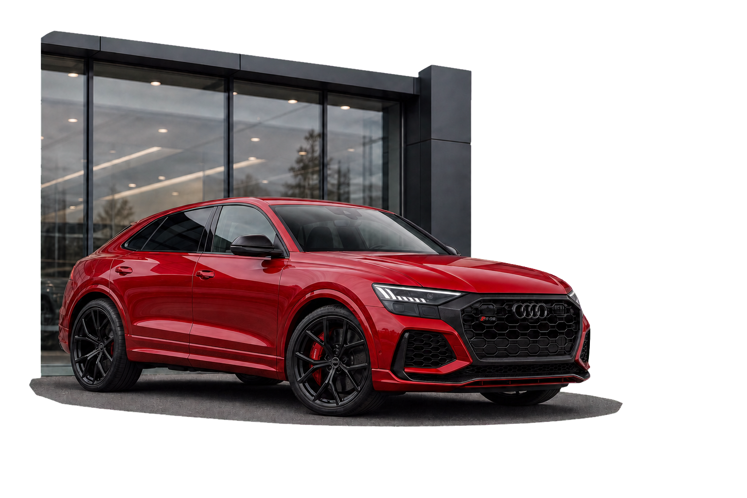 Chilli Red Audi RS Q8 performance outside a modern dealership showroom